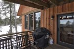 Foote Creek Lodge deck with antique chair. 